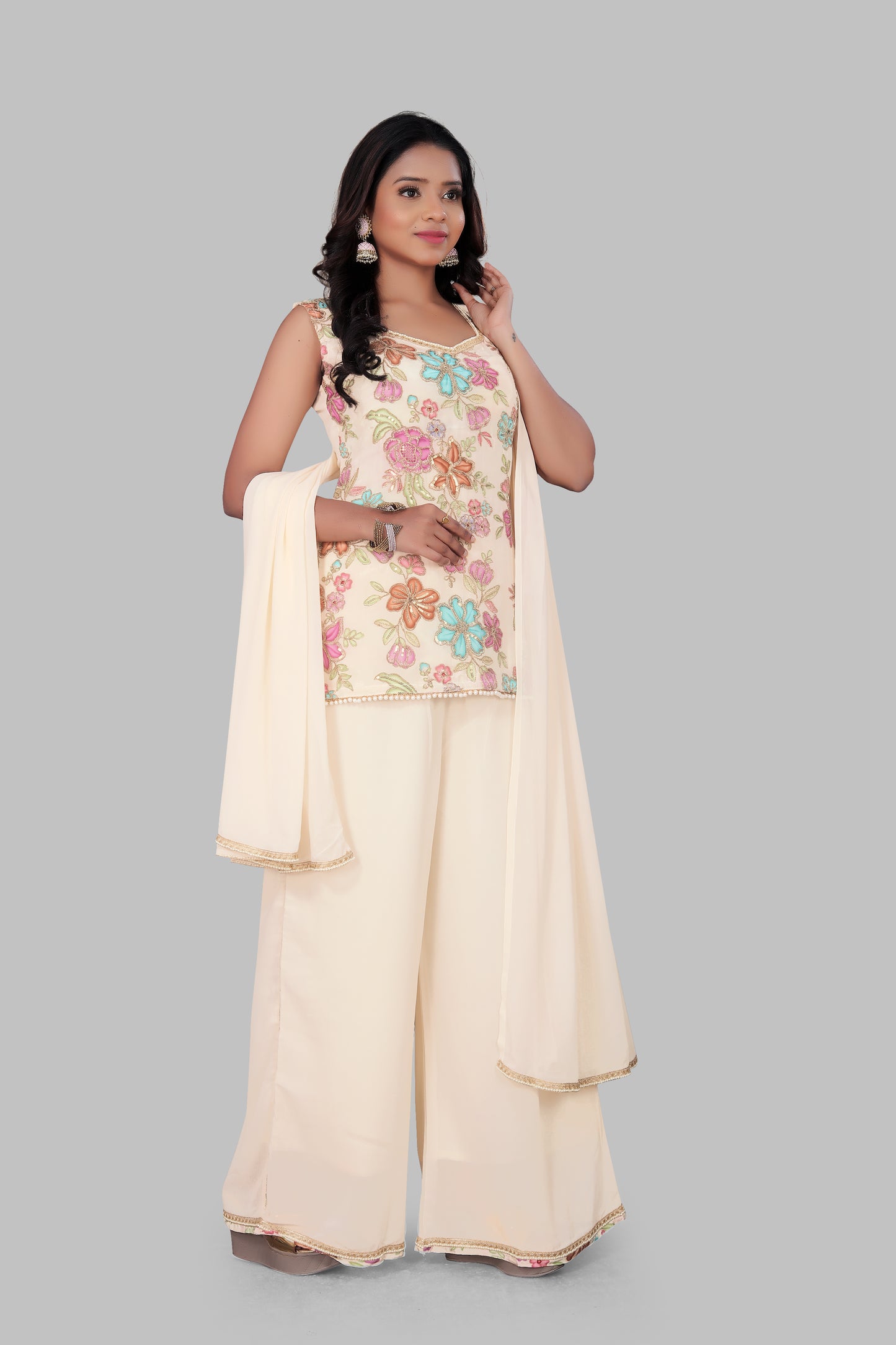 Cream Floral Embroidered Indo-Western Palazzo Set – Sleeveless Pastel Kurti with Wide-Leg Georgette Trousers & Scalloped Lace